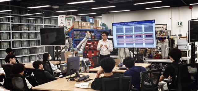 Dr Wen briefs AI & Robotics Club members, Industrial Centre (Aug 2026)
