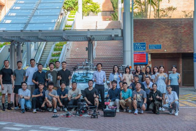 The team with our drones and robots at the PolyU podium