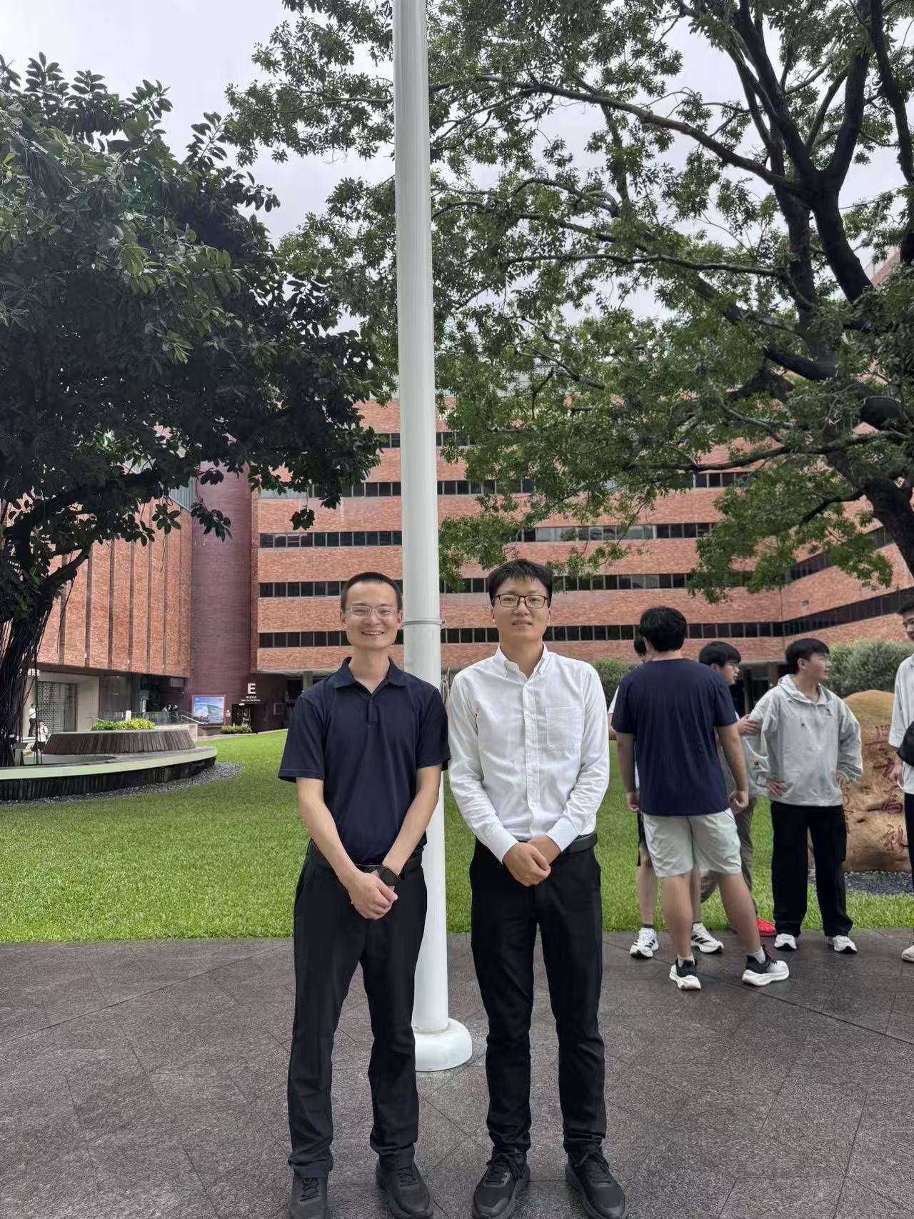 Prof. Weisong Wen and Prof. Wenfeng Nie at The Hong Kong Polytechnic University