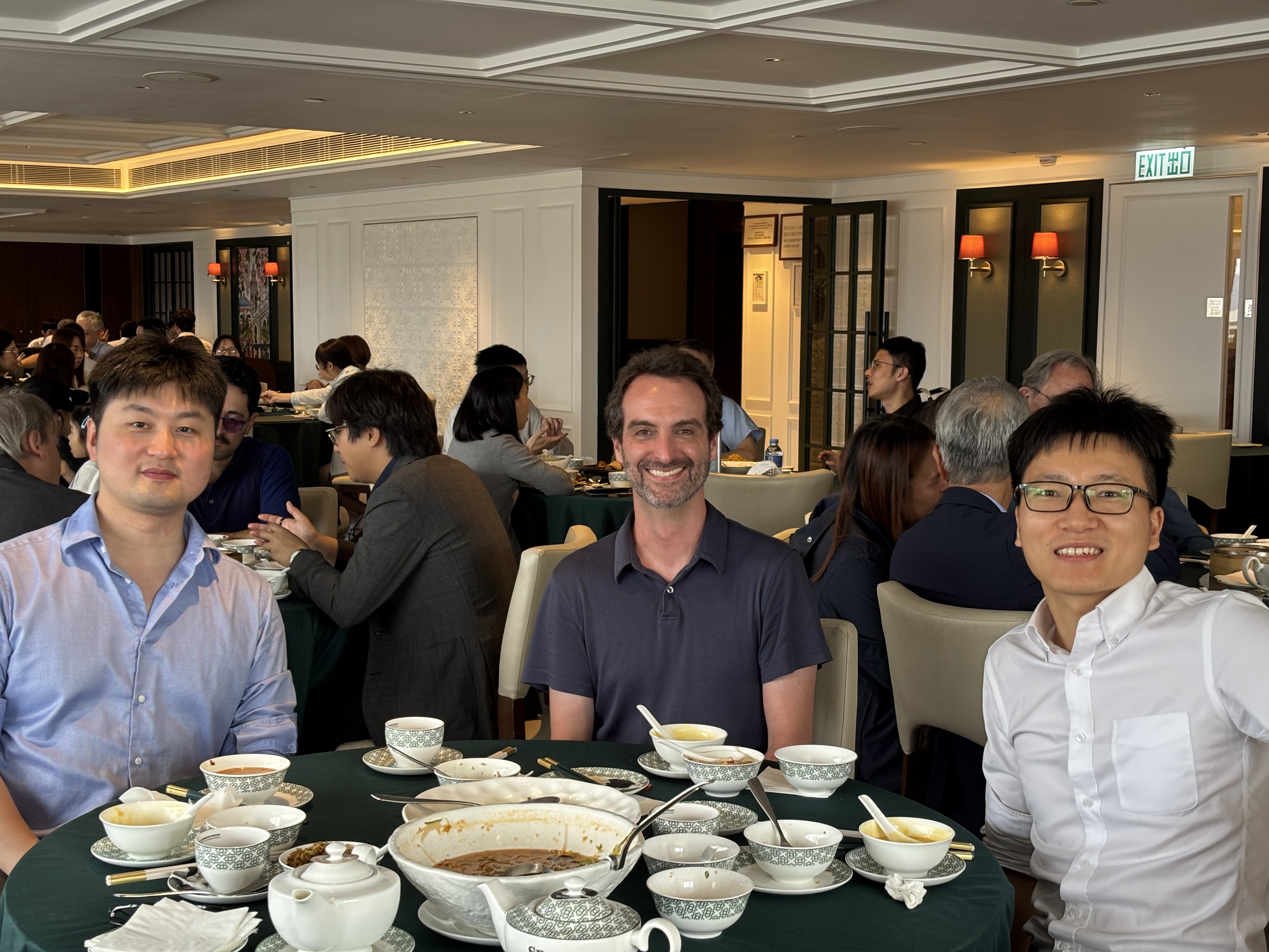 Prof. Chen SUN, Prof. David M. Rosen, and Prof. Weisong WEN during their meeting.