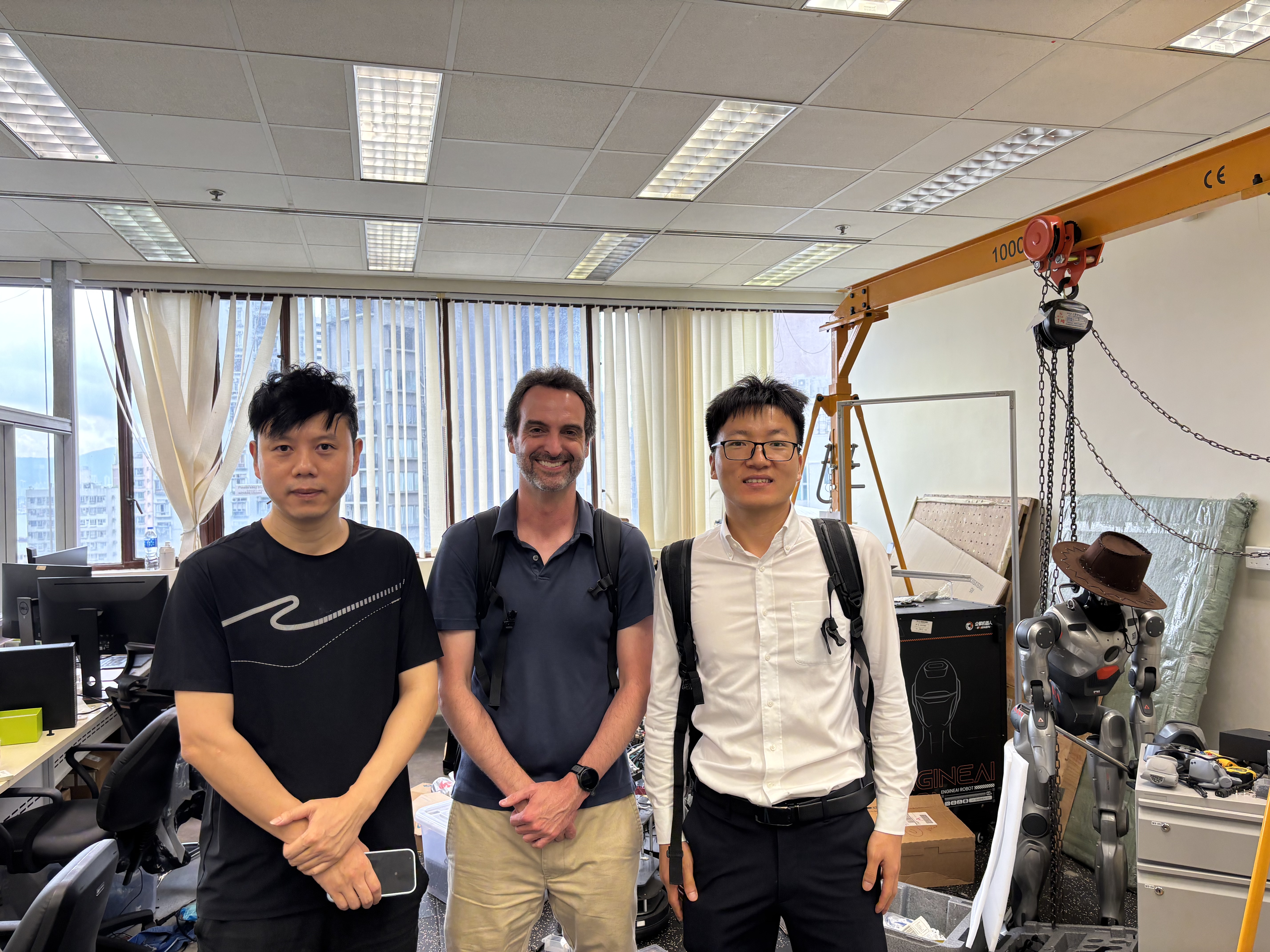 Prof. Peng LU, Prof. David M. Rosen, and Prof. Weisong WEN during the HKU laboratory visit.
