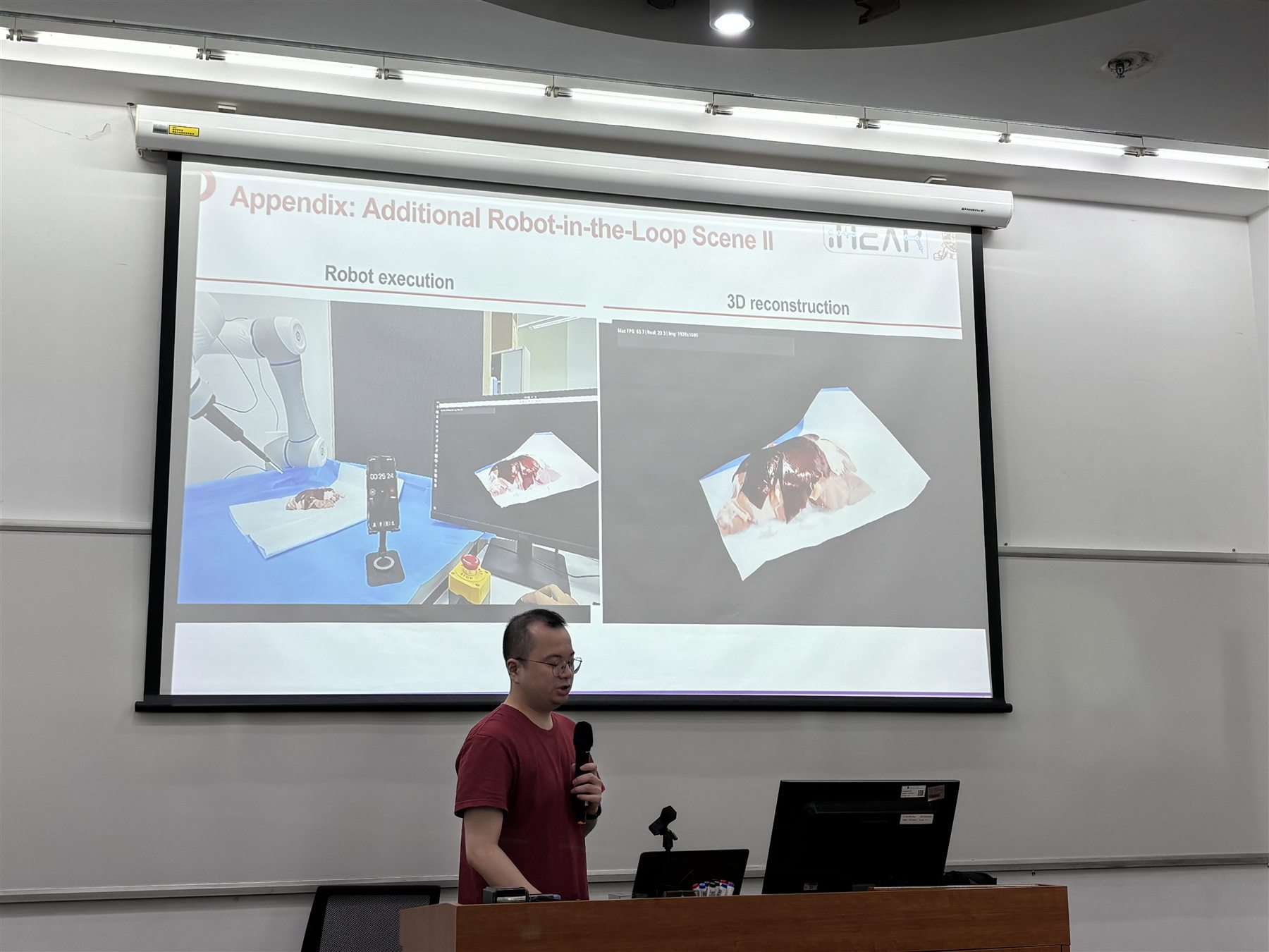A workshop speaker presents research on surgical robotics and 3D reconstruction
