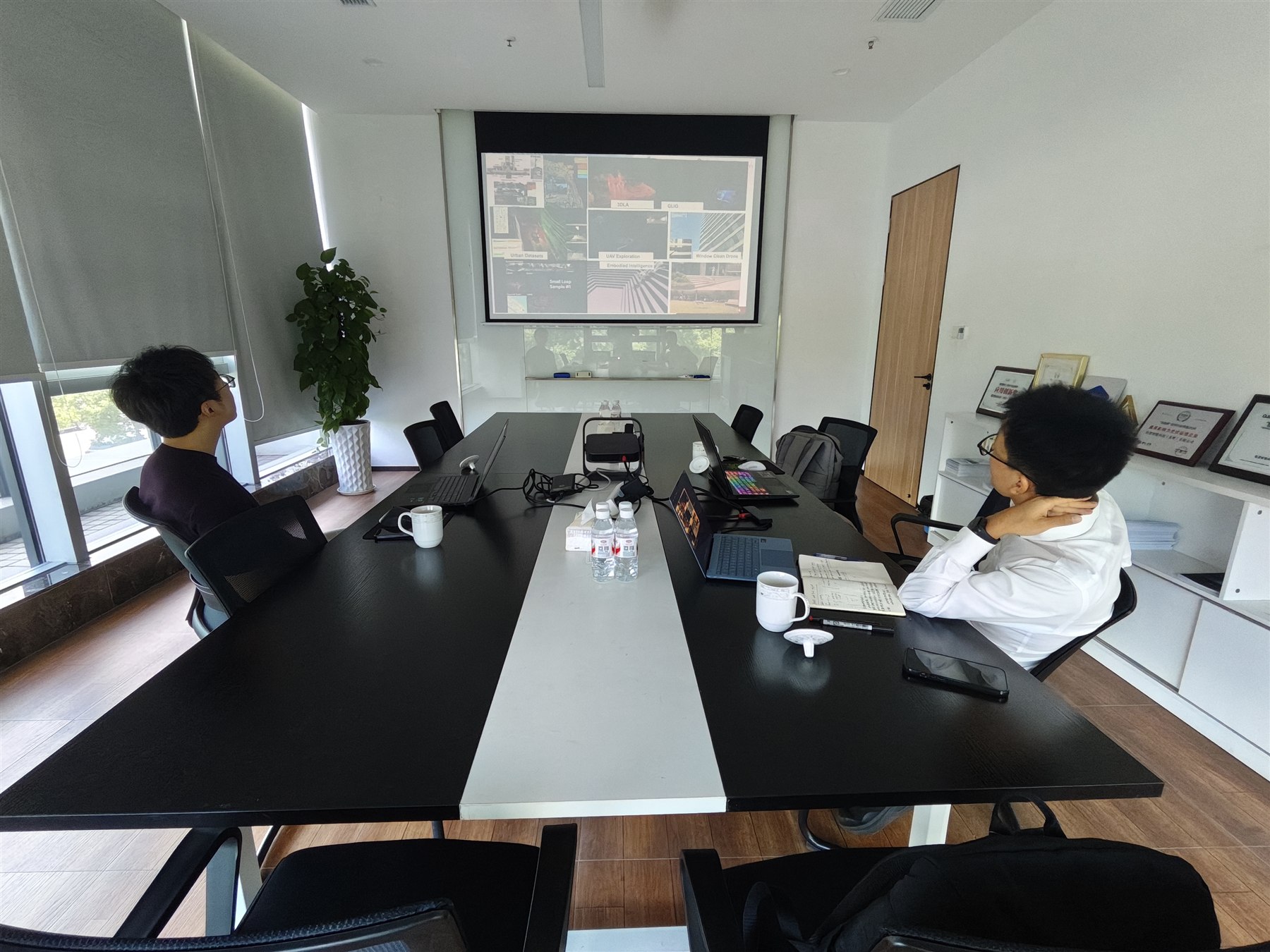 Technical discussion on UAV-based solar panel cleaning collaboration